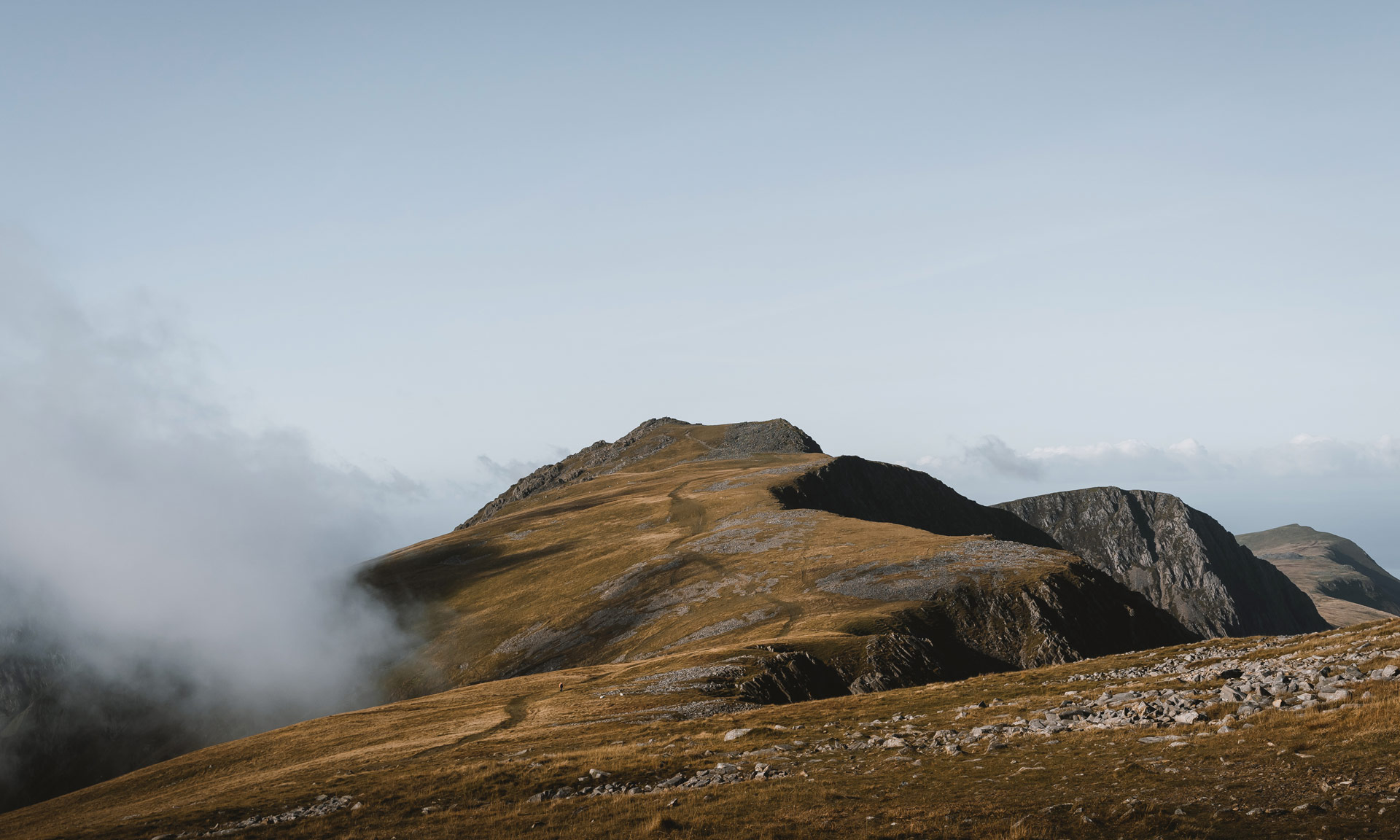 An image of Cader Idris with a cloudy sky