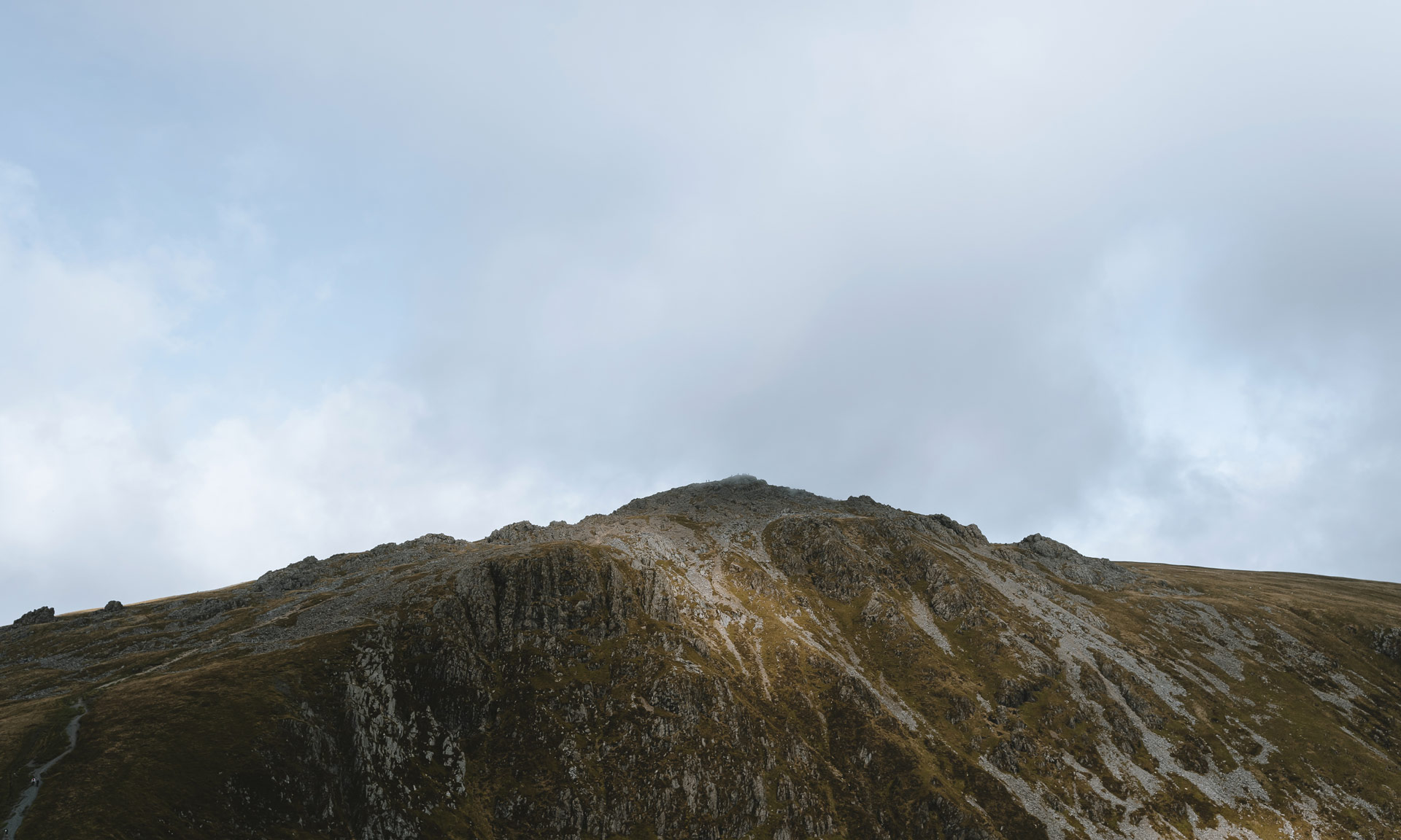 An image of Cader Idris with a cloudy sky