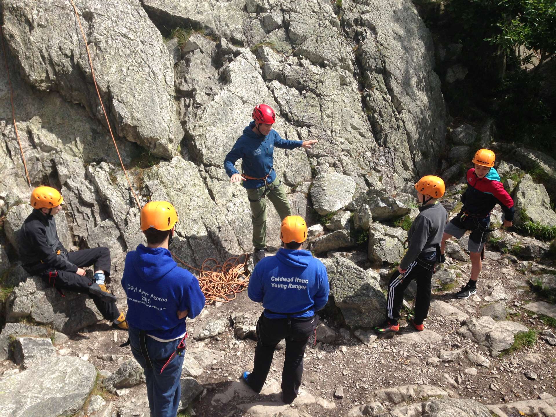 Young Rangers learning to climb with ropes.